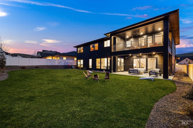 13684 N Sage Grouse Pl, Boise, ID 83714 - rear view of property with ceiling fan, a lawn, a fenced backyard, a balcony, and a patio area
