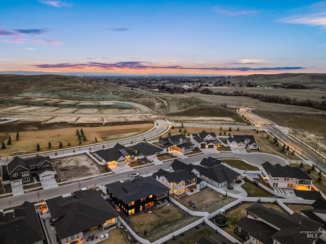 13684 N Sage Grouse Pl, Boise, ID 83714 - aerial view at dusk featuring a residential view
