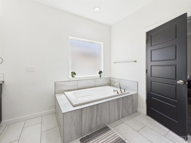 2420 Great Basin Way, Burley, ID 83318 - bathroom with a bath, baseboards, and tile patterned floors