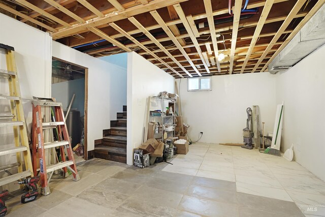 basement featuring tile flooring