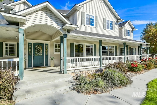 property entrance featuring a porch