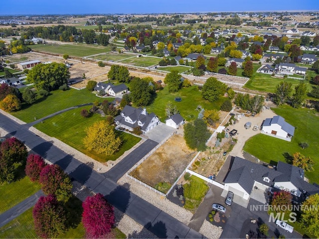 birds eye view of property with a residential view