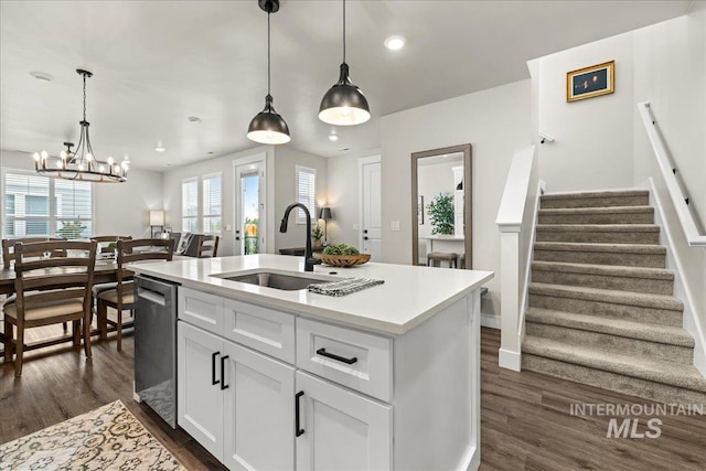 205 S Ripplerock Ln, Star, ID 83669 - kitchen with a sink, dishwasher, dark wood-type flooring, recessed lighting, and light countertops
