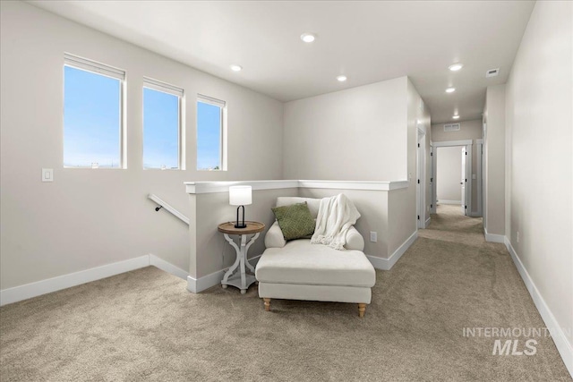 205 S Ripplerock Ln, Star, ID 83669 - living area with carpet flooring, an upstairs landing, recessed lighting, and baseboards