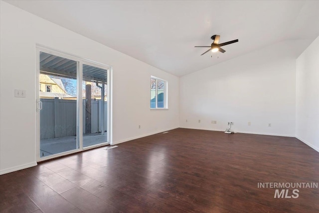 unfurnished room featuring dark hardwood / wood-style floors, plenty of natural light, and ceiling fan