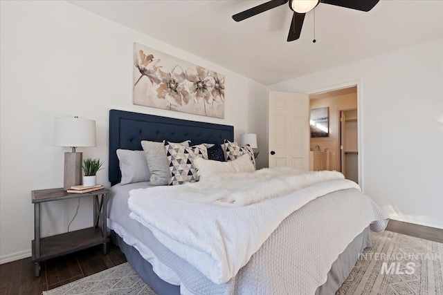 bedroom featuring hardwood / wood-style flooring and ceiling fan