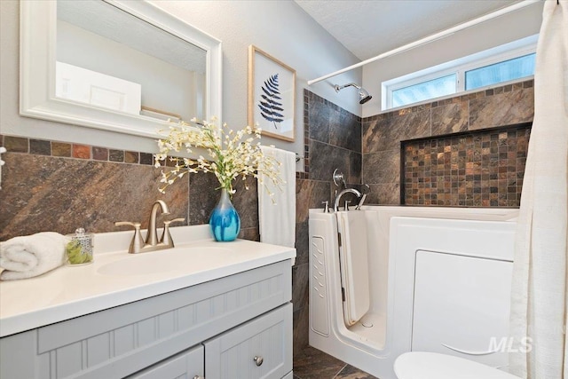 bathroom featuring vanity and walk in shower