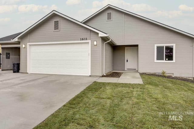 1611 Regency Way, Emmett, ID 83617 - view of front of house with an attached garage, concrete driveway, and a front yard