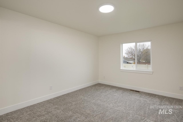 1611 Regency Way, Emmett, ID 83617 - spare room featuring carpet floors and baseboards