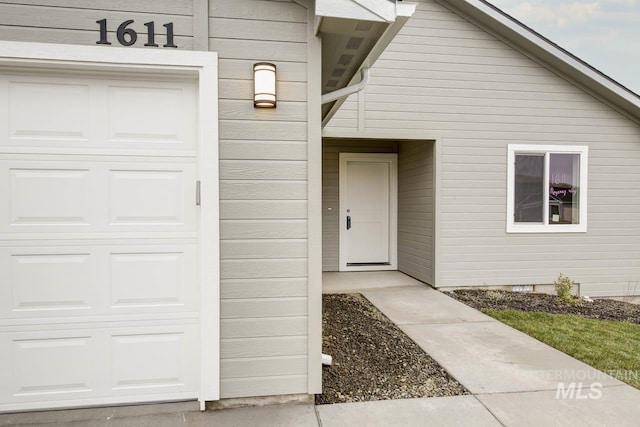 1611 Regency Way, Emmett, ID 83617 - doorway to property with a garage
