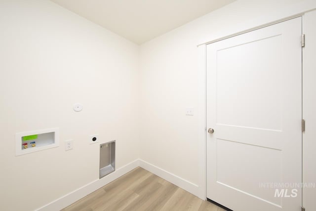 1611 Regency Way, Emmett, ID 83617 - laundry room with light wood-type flooring, hookup for a washing machine, electric dryer hookup, and gas dryer hookup