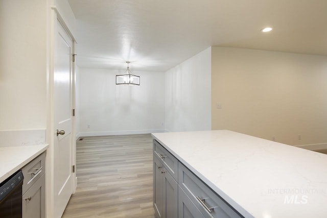 1611 Regency Way, Emmett, ID 83617 - kitchen featuring dishwasher, gray cabinets, light wood finished floors, a chandelier, and recessed lighting