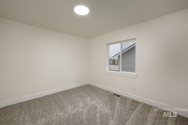 1611 Regency Way, Emmett, ID 83617 - carpeted empty room with baseboards