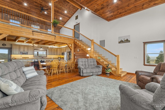 340 Gill Point Rd, Grangeville, ID 83530 - living room with wood ceiling, high vaulted ceiling, light hardwood / wood-style floors, and beam ceiling