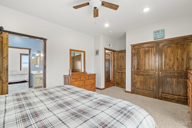 340 Gill Point Rd, Grangeville, ID 83530 - carpeted bedroom with a closet, ensuite bathroom, ceiling fan, and sink