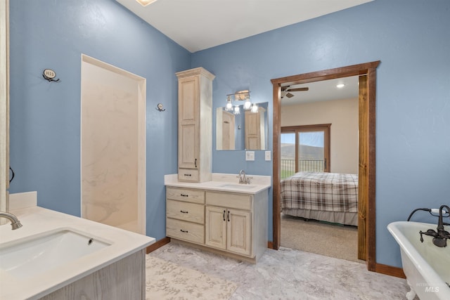 340 Gill Point Rd, Grangeville, ID 83530 - bathroom with vanity, ceiling fan, and a tub