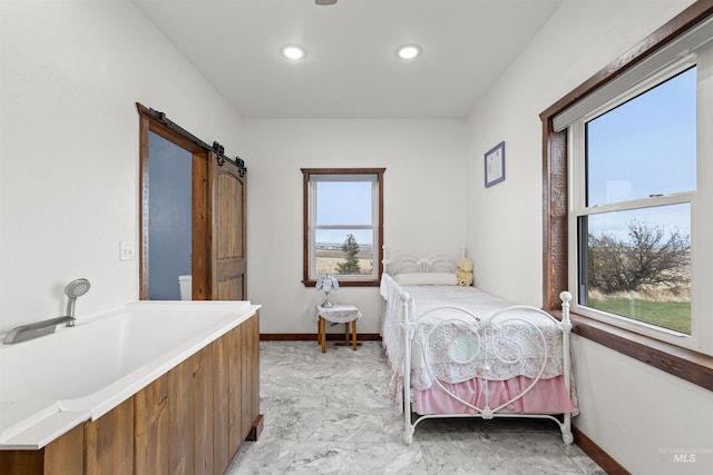 340 Gill Point Rd, Grangeville, ID 83530 - bedroom with a barn door and multiple windows