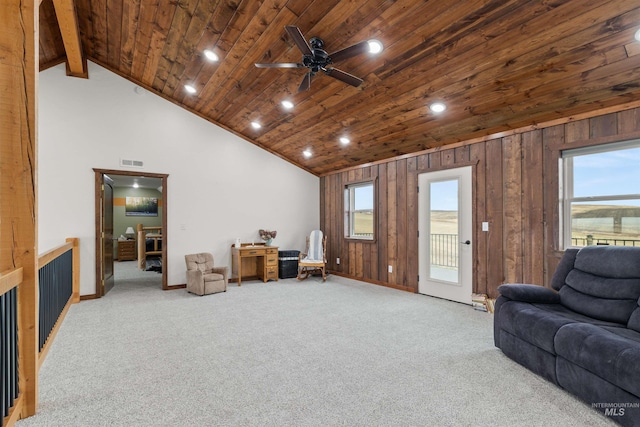340 Gill Point Rd, Grangeville, ID 83530 - living room with a healthy amount of sunlight, light colored carpet, and lofted ceiling with beams