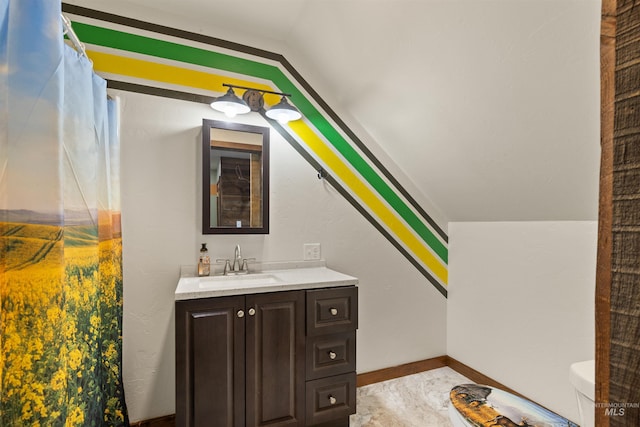 340 Gill Point Rd, Grangeville, ID 83530 - bathroom with vanity, toilet, and lofted ceiling