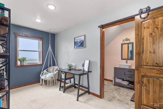 340 Gill Point Rd, Grangeville, ID 83530 - carpeted office with a barn door, lofted ceiling, and sink