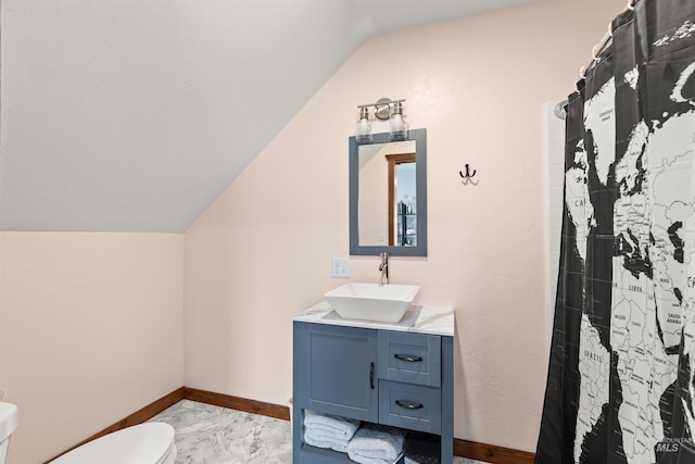 340 Gill Point Rd, Grangeville, ID 83530 - bathroom featuring toilet, a shower with curtain, vanity, and vaulted ceiling