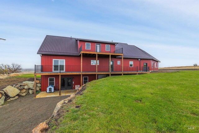 340 Gill Point Rd, Grangeville, ID 83530 - rear view of property with a yard and french doors