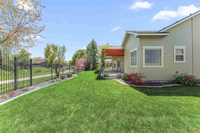 view of yard with a patio and fence