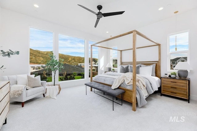 2528 S Linnet Pl, Boise, ID 83716 - bedroom with light carpet, recessed lighting, a ceiling fan, and a mountain view