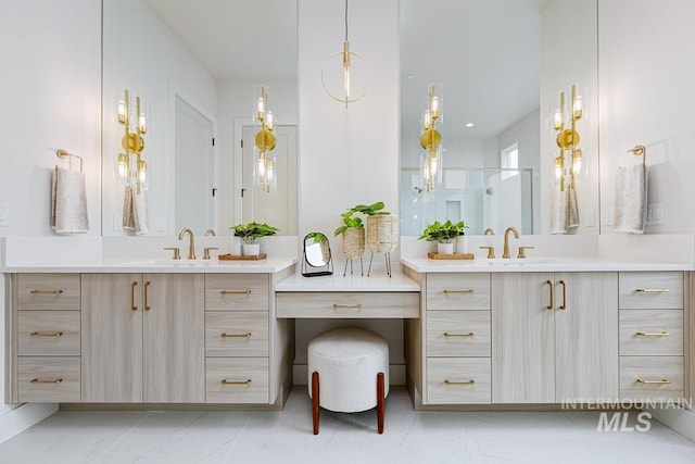 2528 S Linnet Pl, Boise, ID 83716 - bathroom featuring two vanities, a stall shower, and marble finish flooring