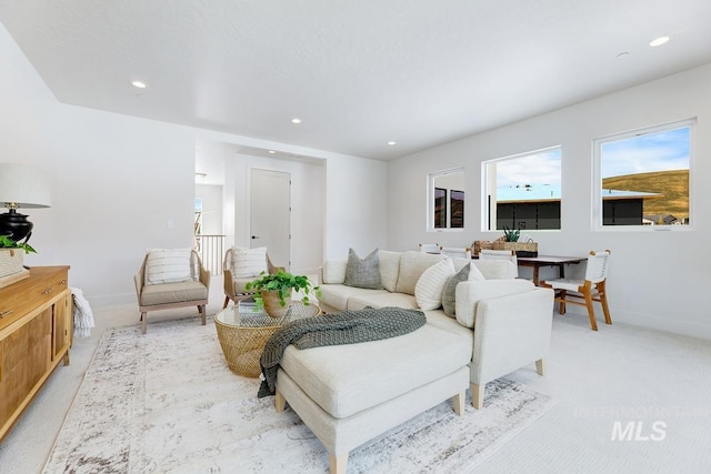 2528 S Linnet Pl, Boise, ID 83716 - living area with light carpet, baseboards, and recessed lighting