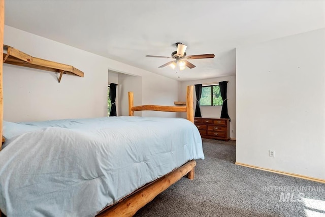 carpeted bedroom with baseboards and ceiling fan