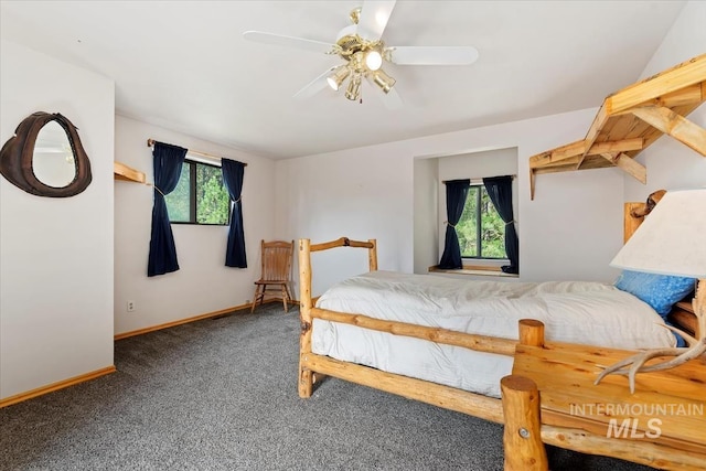 bedroom with carpet floors, baseboards, and ceiling fan