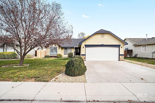 single story home with stone siding, a garage, fence, a front yard, and driveway