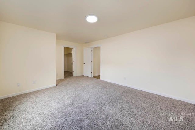 empty room featuring carpet floors