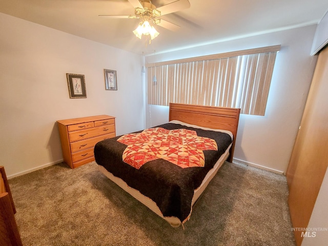 bedroom featuring carpet, baseboards, and ceiling fan