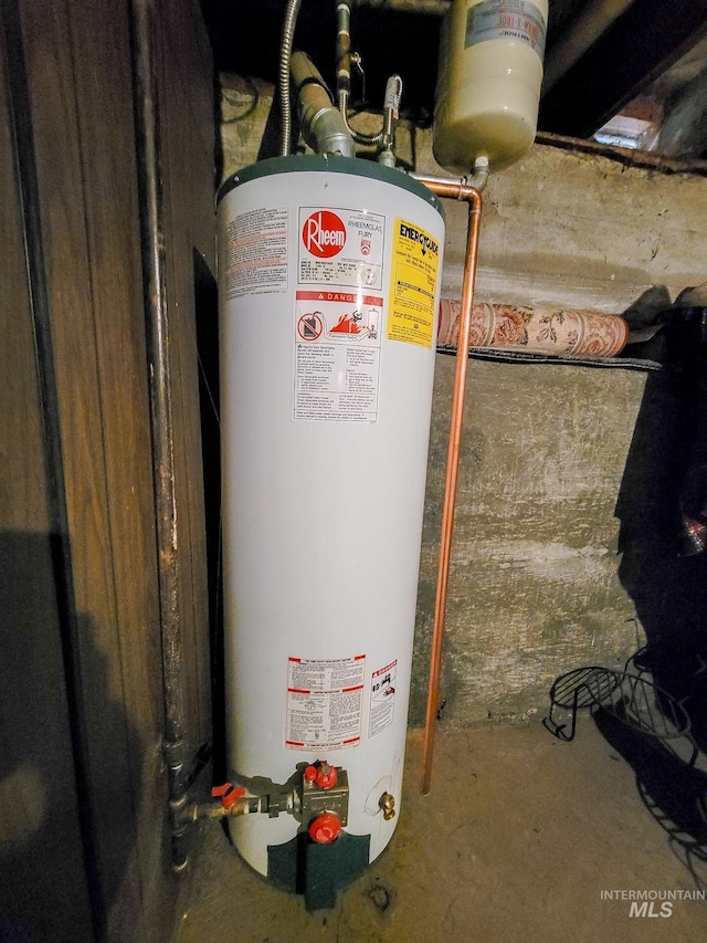 utility room featuring gas water heater