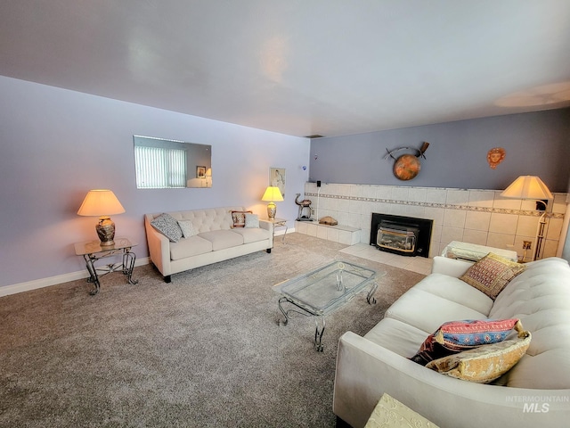 living room featuring carpet floors, a fireplace, and baseboards