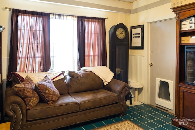 10489 Scotch Pine Rd, Payette, ID 83661 - living room featuring dark tile patterned flooring and heating unit