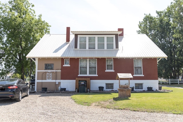 10489 Scotch Pine Rd, Payette, ID 83661 - back of house with a metal roof and brick siding