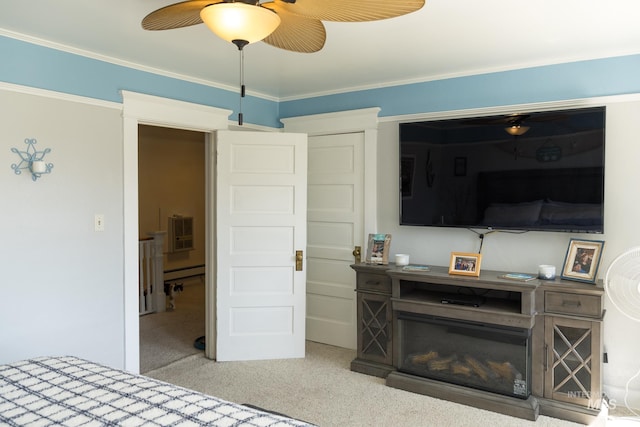 10489 Scotch Pine Rd, Payette, ID 83661 - carpeted bedroom featuring a baseboard heating unit, crown molding, and ceiling fan