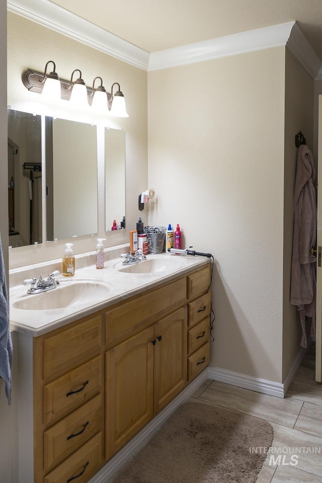 10489 Scotch Pine Rd, Payette, ID 83661 - full bathroom featuring double vanity and ornamental molding