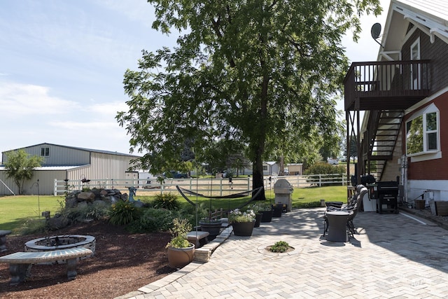 10489 Scotch Pine Rd, Payette, ID 83661 - view of patio featuring an outdoor fire pit, stairs, a grill, and a wooden deck
