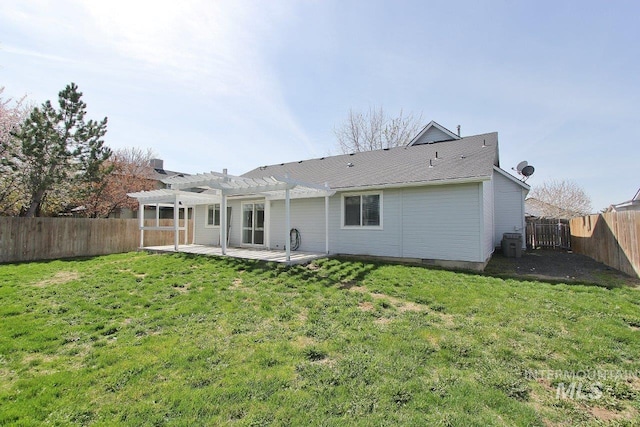 back of house featuring a lawn, a pergola, a fenced backyard, and cooling unit