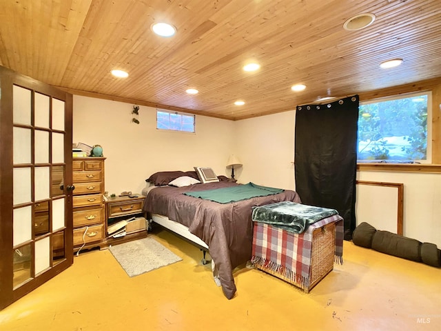 bedroom featuring wood ceiling, finished concrete floors, and recessed lighting