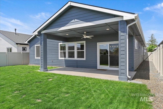 2967 E Diorite St, Nampa, ID 83686 - rear view of house with ceiling fan and a patio