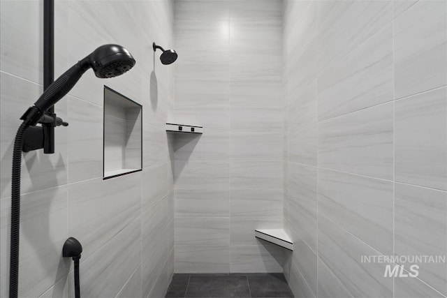 124 S Eagles Roost Way, Eagle, ID 83616 - bathroom with tiled shower and tile patterned floors