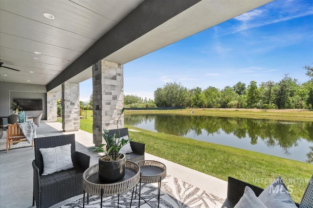 124 S Eagles Roost Way, Eagle, ID 83616 - view of patio / terrace featuring a water view and ceiling fan