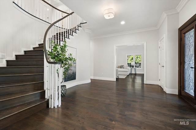 foyer featuring stairway, ornamental molding, wood finished floors, baseboards, and recessed lighting