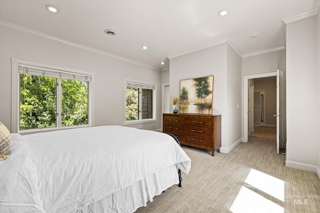bedroom with light colored carpet, recessed lighting, baseboards, and crown molding