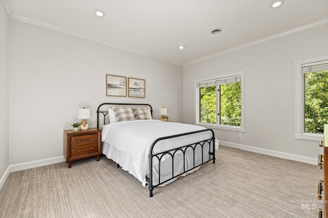 bedroom with baseboards, ornamental molding, recessed lighting, and light carpet